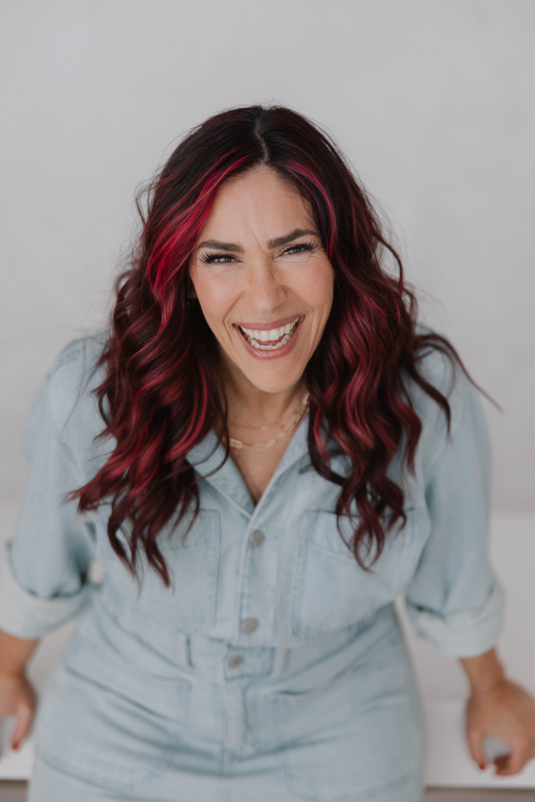 Michelle laughing leaning in